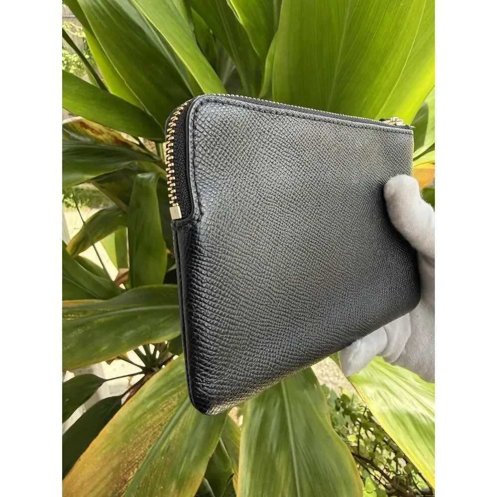 Coach corner zip